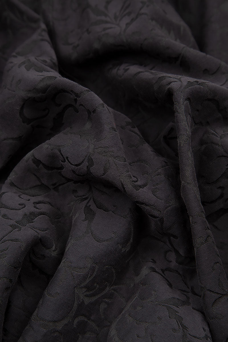 Weit geschnittene, verzierte schwarze Seiden-Baumwollhose