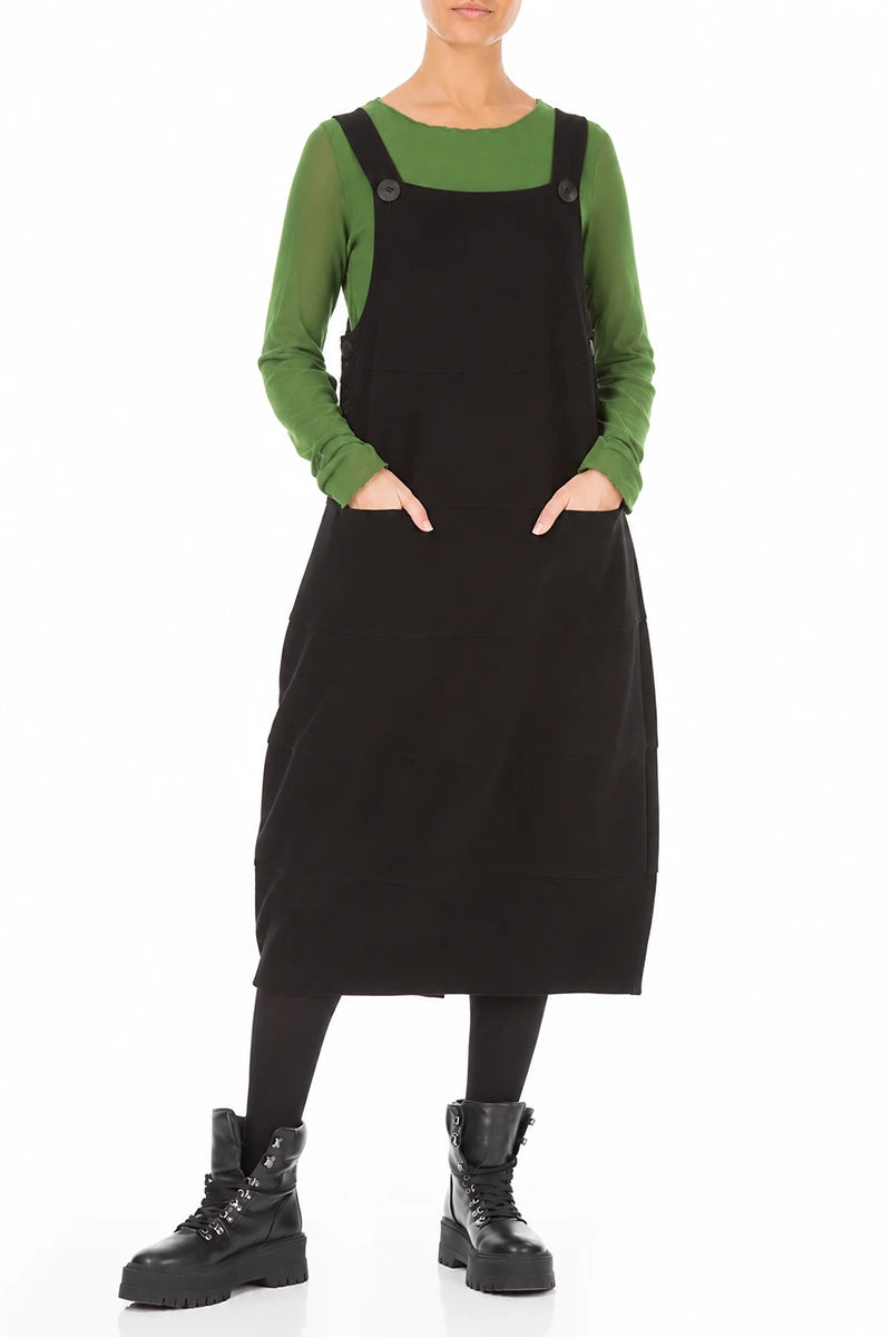 Schwarzes Latzkleid aus Baumwolljersey mit Ballonärmeln