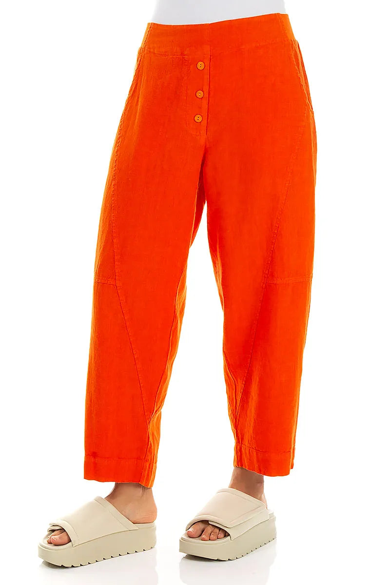 Hosen aus leuchtend orangefarbenem Leinen mit Knöpfen