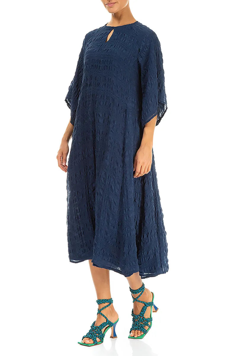 Robe longue en soie bleu marine superposée