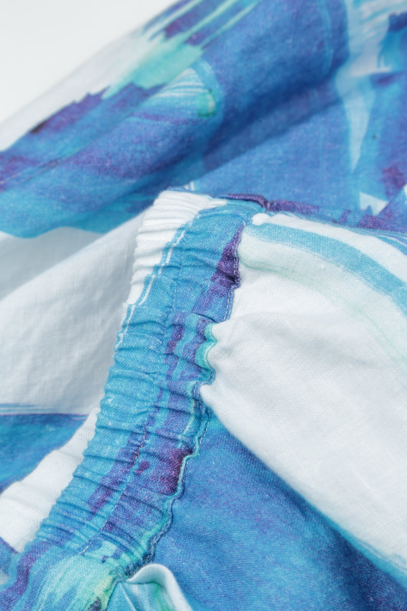 Rock aus Leinen mit ausgefranstem Saum und blauen Pinselstrichen