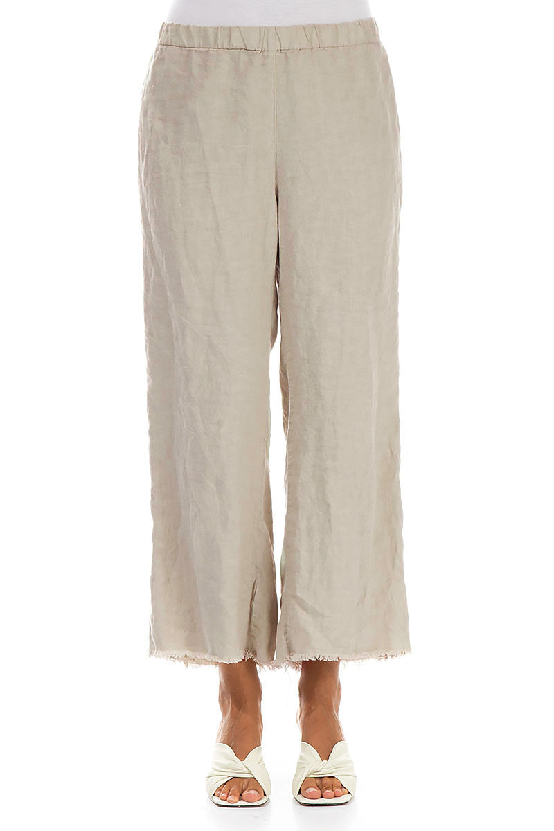 Pantalon en lin évasé beige à franges