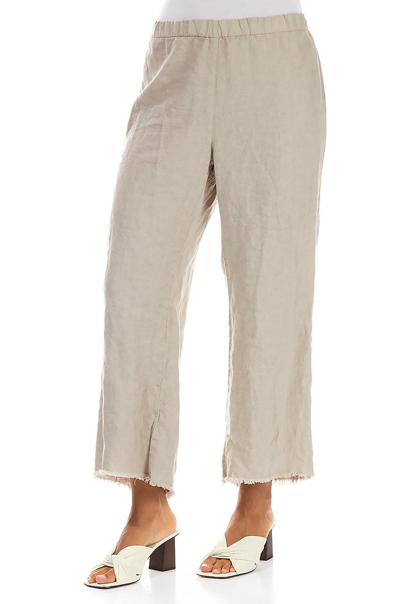 Pantalon en lin évasé beige à franges