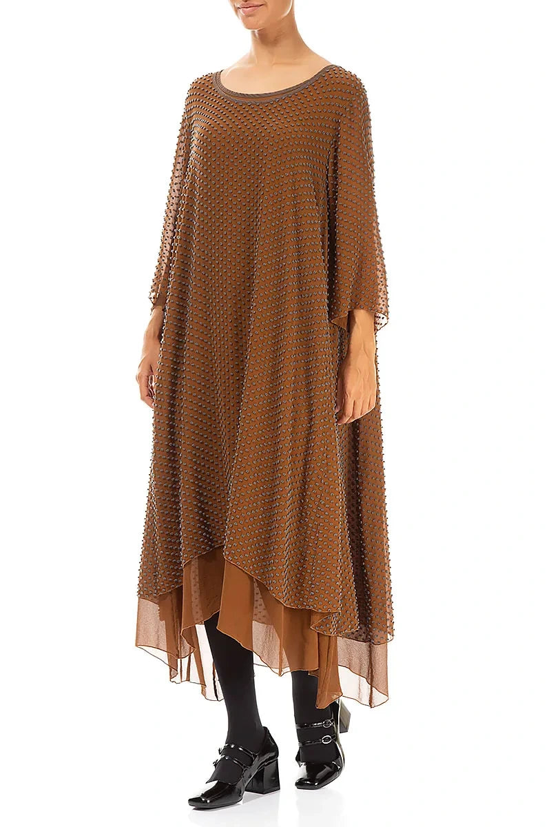 Robe en soie cuivrée vieillie à pois superposés