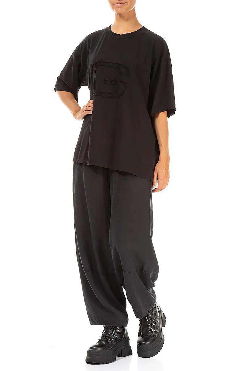 Lockere schwarze Baumwollbluse