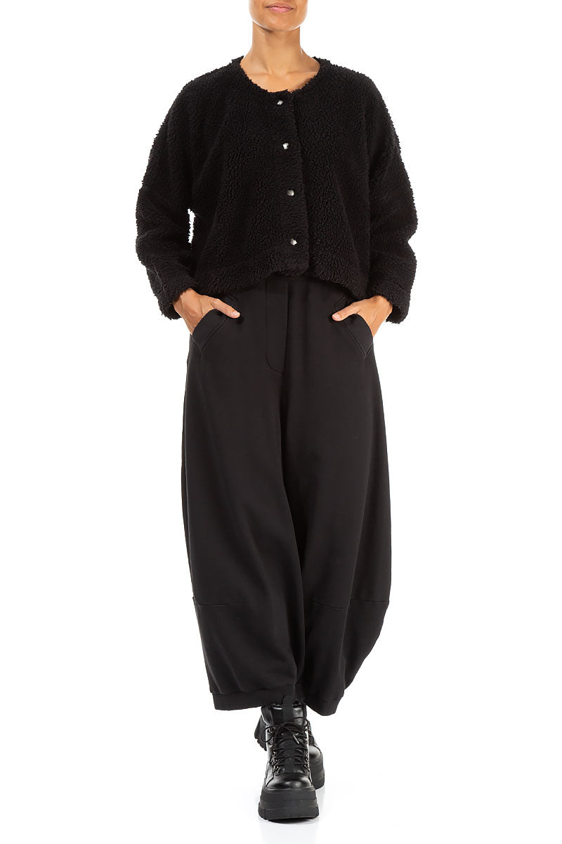 Schwarze Teddy-Baumwolljacke mit Druckknopfverschluss vorne
