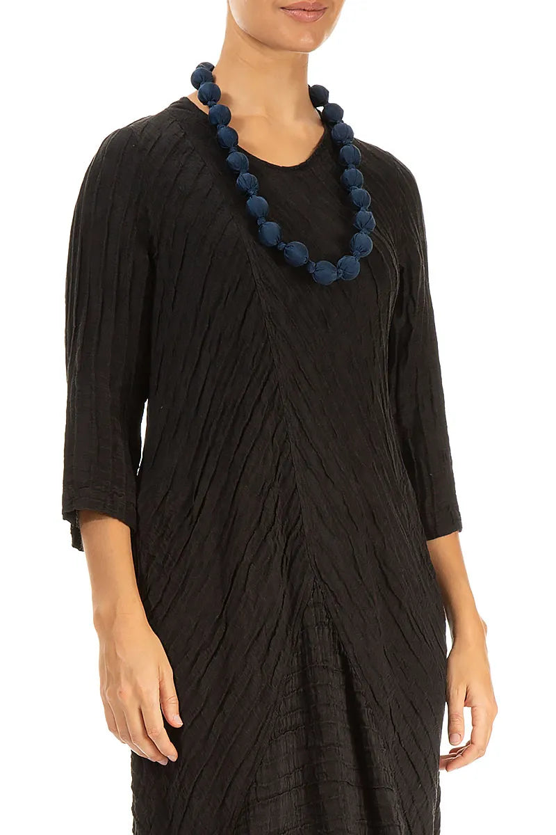 Collier de perles de bambou en soie bleu nuit