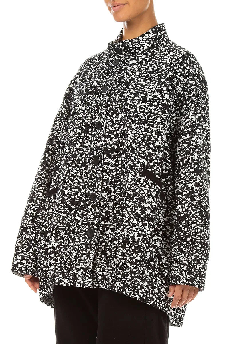 Wendbare Jacke aus gesprenkelter schwarz-weißer Baumwolle