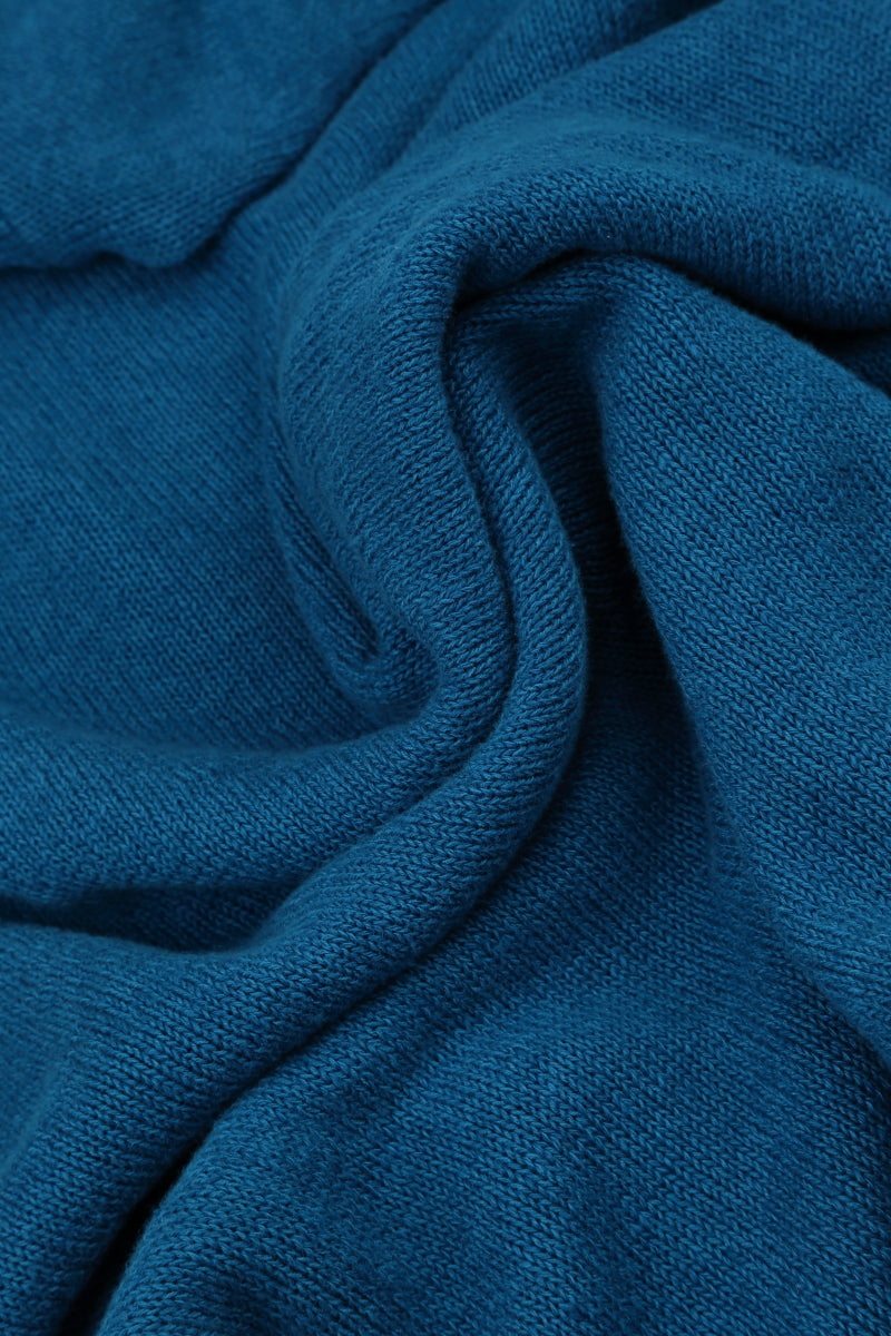 Pull en lin bleu cobalt à larges rayures ondulées