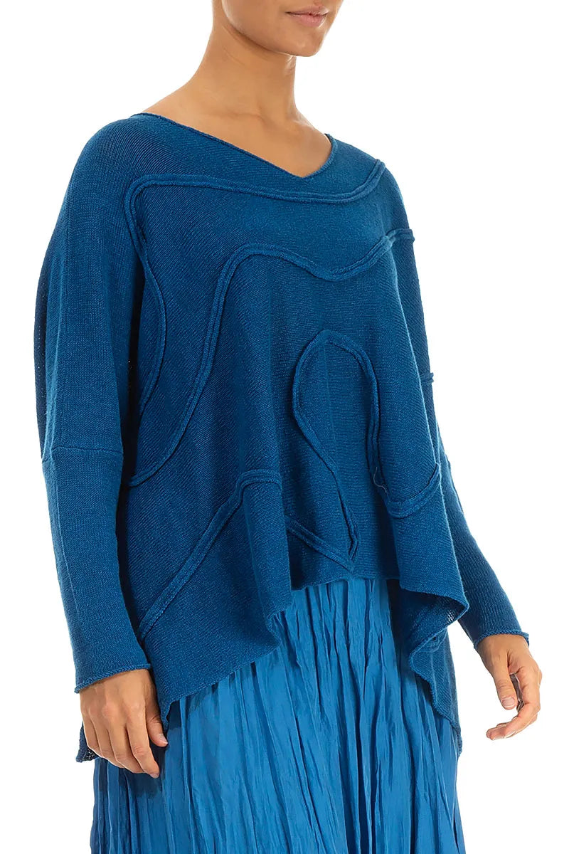 Pull en lin bleu cobalt à larges rayures ondulées