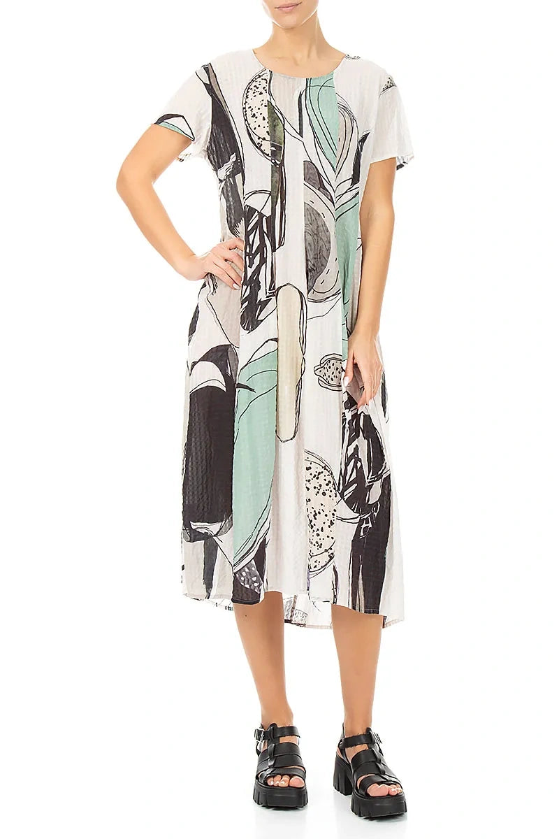 Robe en soie texturée motif galets coupe ballon