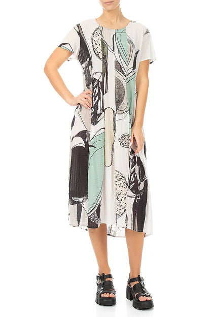 Robe en soie texturée motif galets coupe ballon