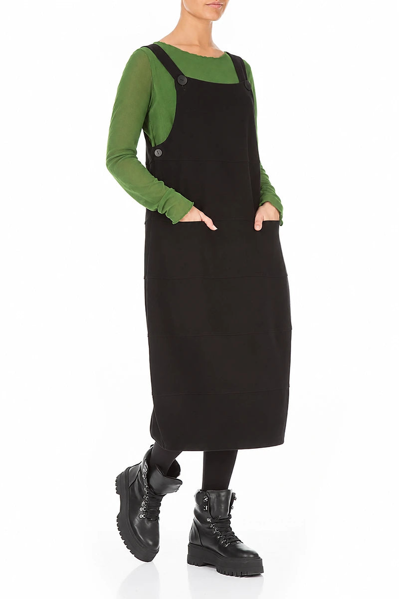 Schwarzes Latzkleid aus Baumwolljersey mit Ballonärmeln