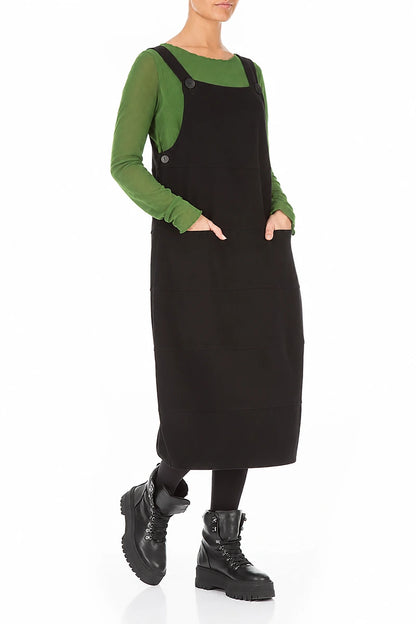 Schwarzes Latzkleid aus Baumwolljersey mit Ballonärmeln