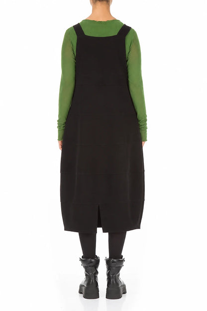 Schwarzes Latzkleid aus Baumwolljersey mit Ballonärmeln