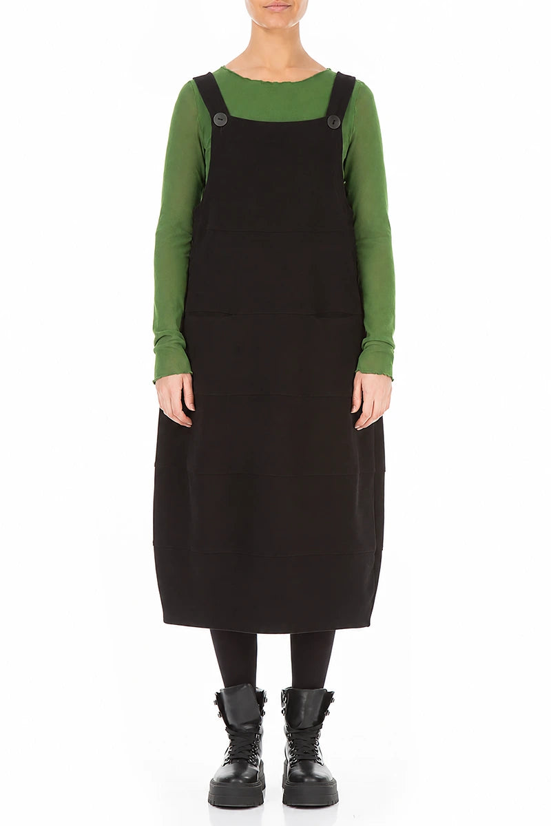 Schwarzes Latzkleid aus Baumwolljersey mit Ballonärmeln