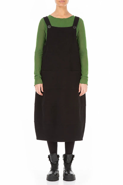 Schwarzes Latzkleid aus Baumwolljersey mit Ballonärmeln