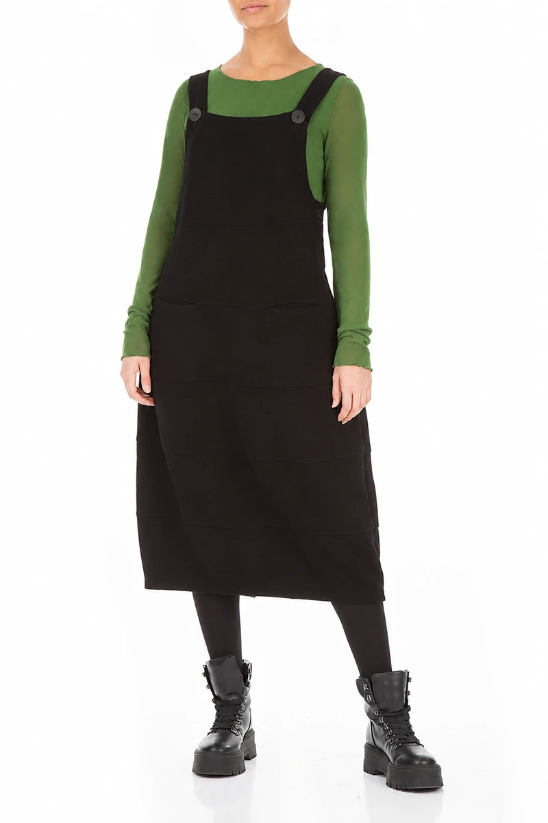 Schwarzes Latzkleid aus Baumwolljersey mit Ballonärmeln