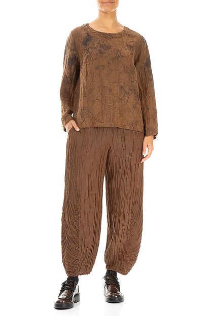 Chemisier en soie froissée à effet marbre cuivré vieilli et coupe carrée