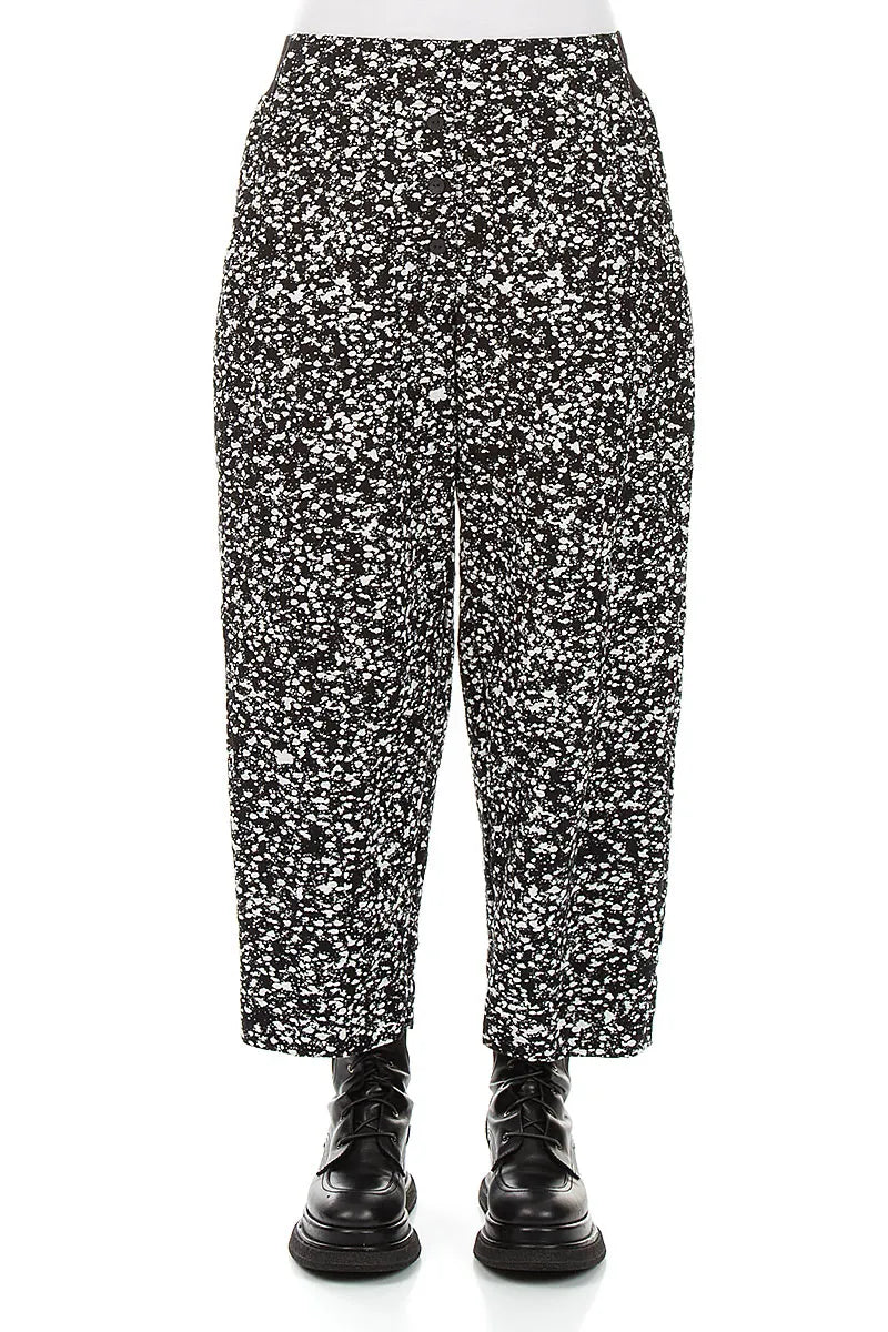 Geknöpfte Hose aus gesprenkelter schwarz-weißer Baumwolle