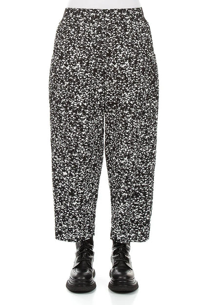 Geknöpfte Hose aus gesprenkelter schwarz-weißer Baumwolle