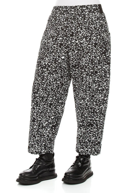 Geknöpfte Hose aus gesprenkelter schwarz-weißer Baumwolle