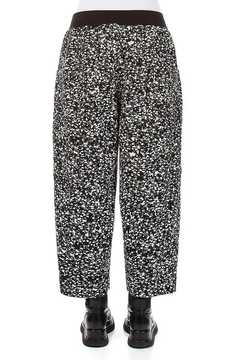 Geknöpfte Hose aus gesprenkelter schwarz-weißer Baumwolle