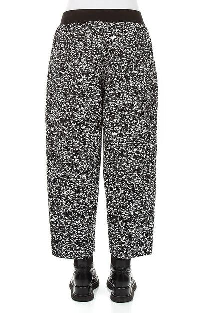 Geknöpfte Hose aus gesprenkelter schwarz-weißer Baumwolle