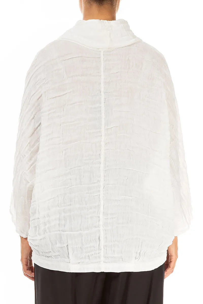 Bluse aus cremefarbenem Seidenleinen mit Wasserfallausschnitt und Kreismuster