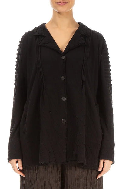 Schwarze, gewellte Baumwolljacke mit detaillierter Schulterpartie