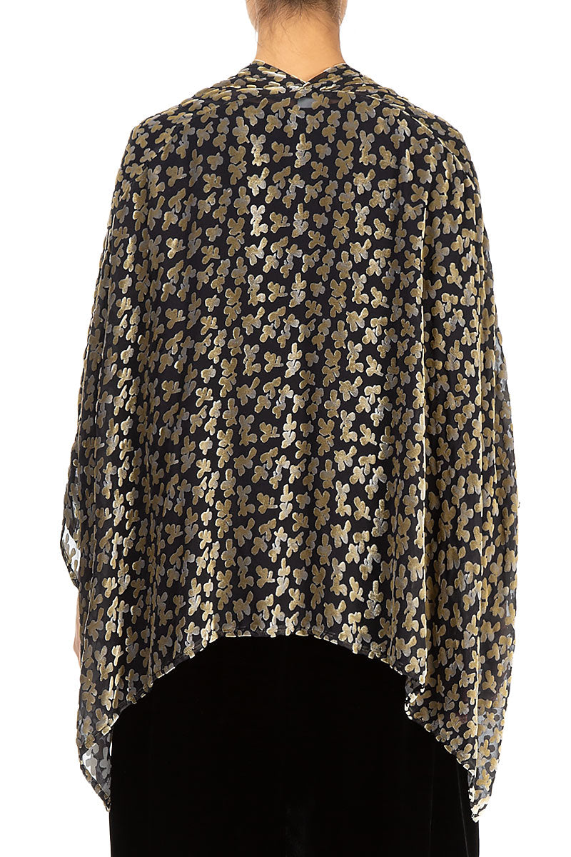 Veste en velours de soie doré à pétales dévorés