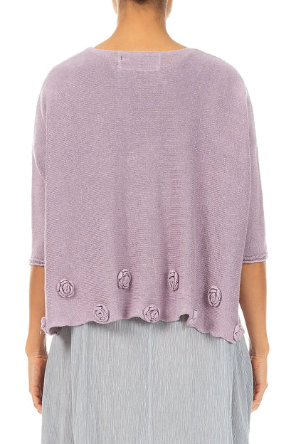 Pull en lin lilas orné de fleurs