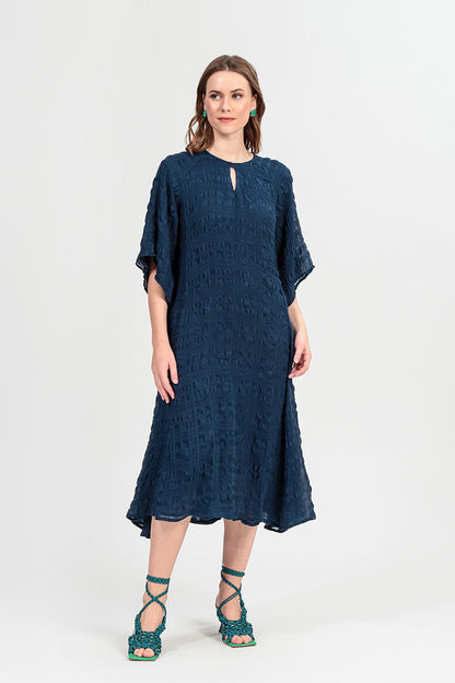 Robe longue en soie bleu marine superposée