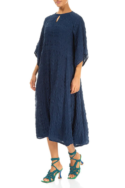 Robe longue en soie bleu marine superposée
