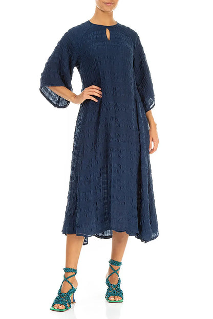 Robe longue en soie bleu marine superposée