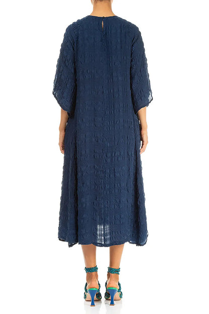 Robe longue en soie bleu marine superposée
