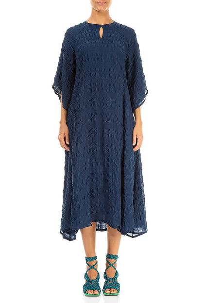 Robe longue en soie bleu marine superposée