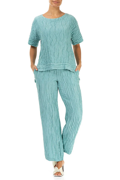 Bluse aus mintfarbenem Seidenleinen mit horizontalem Saum und Knittereffekt