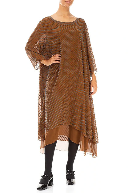 Robe en soie cuivrée vieillie à pois superposés