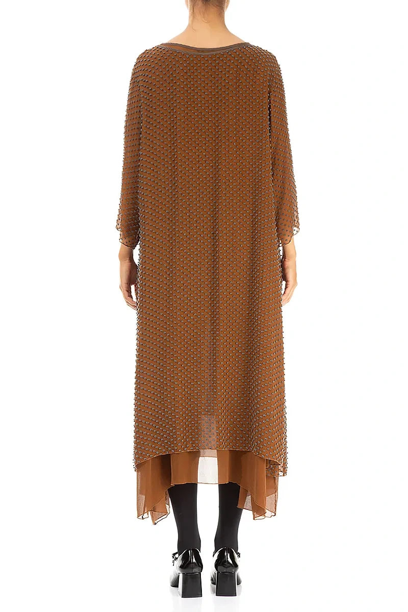 Robe en soie cuivrée vieillie à pois superposés