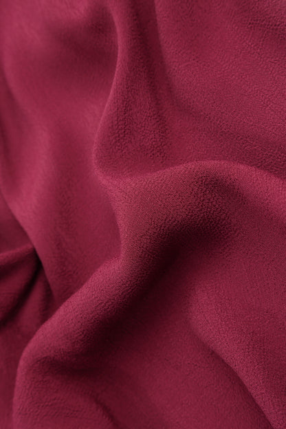Pantalon long fuselé en viscose bordeaux