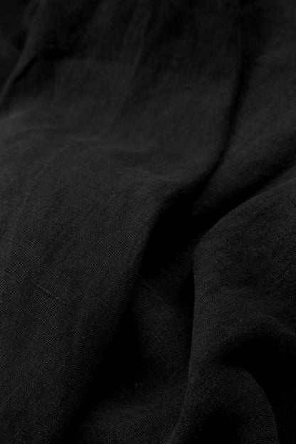 Lockere, verkürzte schwarze Leinenhose