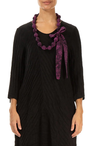 Collier de perles en soie et coton marbré magenta