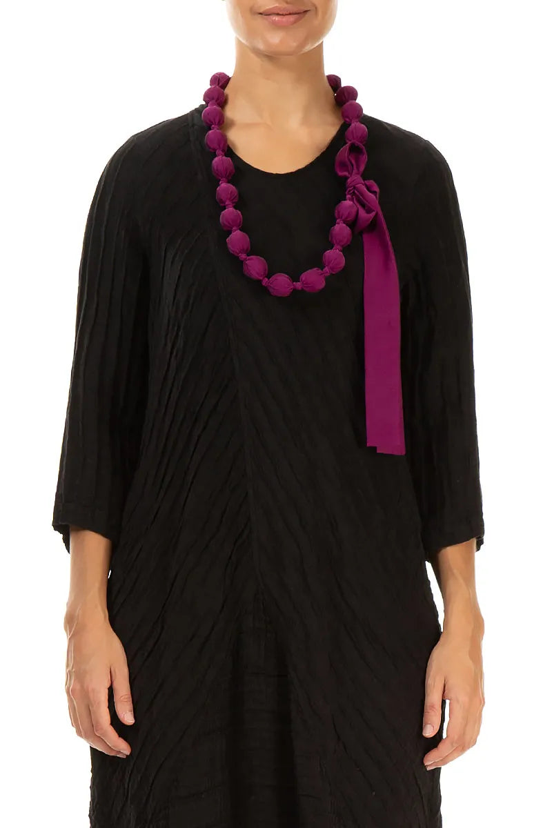 Collier de perles de soie magenta