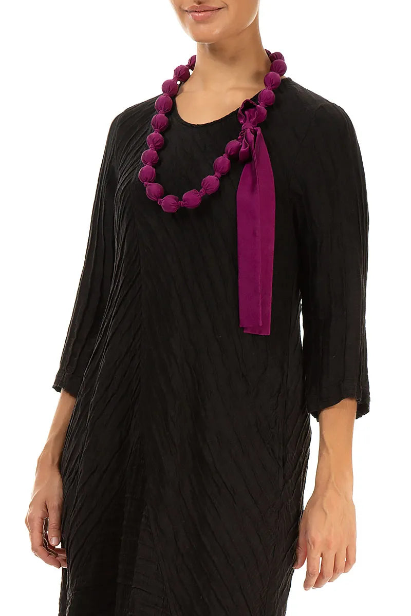 Collier de perles de soie magenta