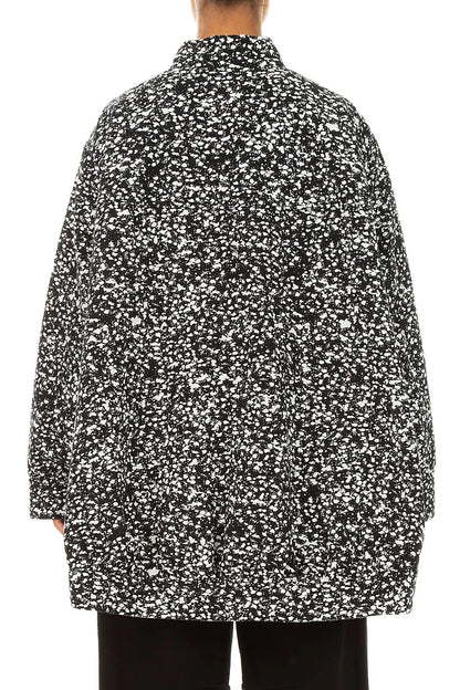 Wendbare Jacke aus gesprenkelter schwarz-weißer Baumwolle