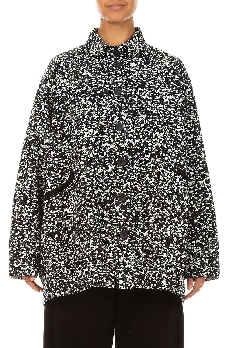 Wendbare Jacke aus gesprenkelter schwarz-weißer Baumwolle