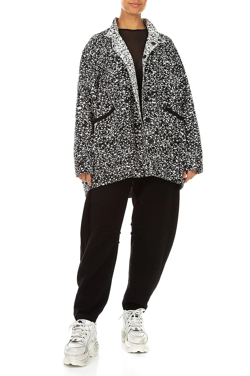 Wendbare Jacke aus gesprenkelter schwarz-weißer Baumwolle