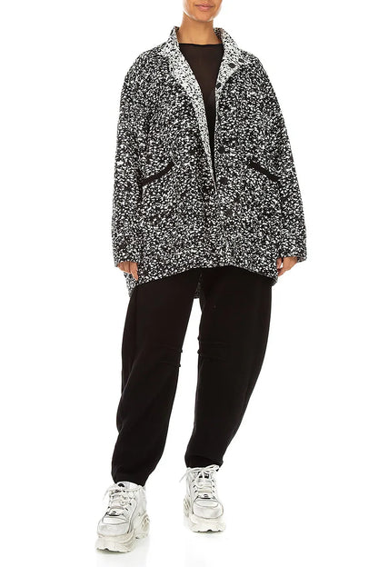 Wendbare Jacke aus gesprenkelter schwarz-weißer Baumwolle