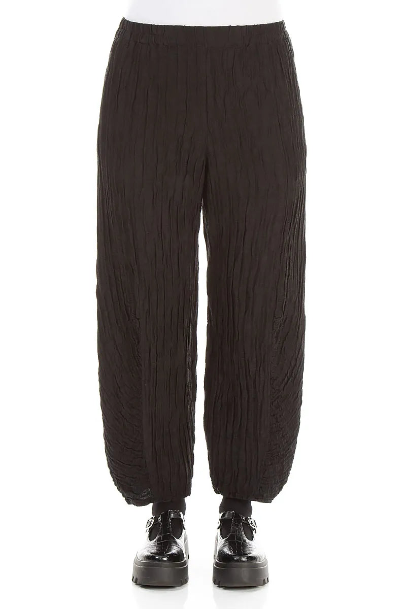 Schwarze Hose aus gekräuseltem Seidenleinen mit gerüschtem Saum
